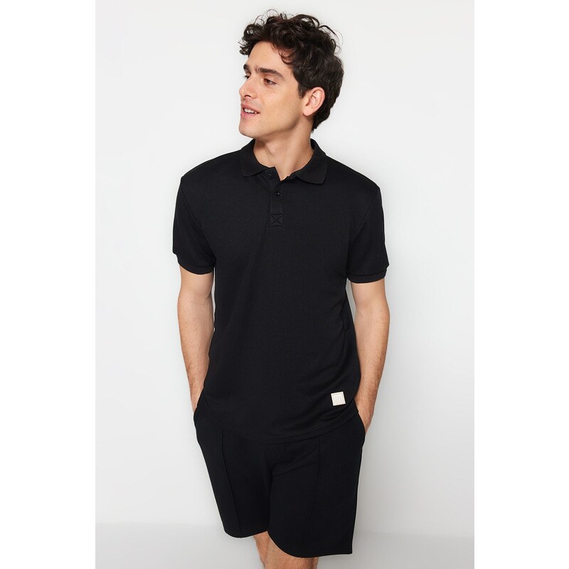 Trendyol Black Regular/Regular Fit Short Sleeve Label Appliqué Polo Neck T-shirt