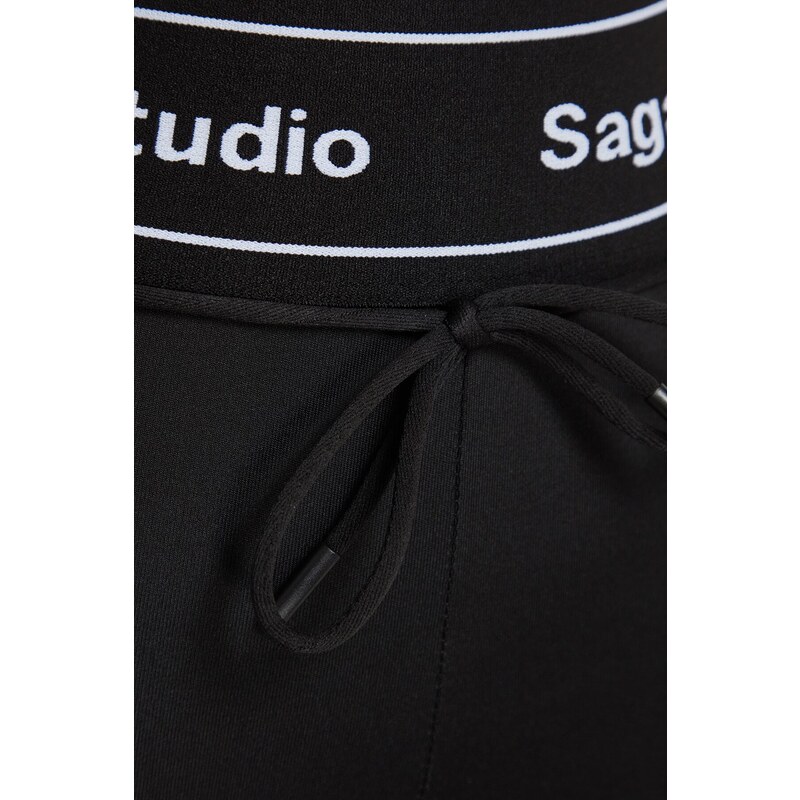 Trendyol X Sagaza Studio Black Stretchy Sports Tights with Piping Detailed and Push-Up Stitching.