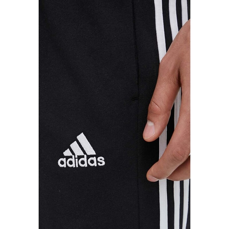 Tréninkové kalhoty adidas Essentials černá barva, s aplikací, IC0044