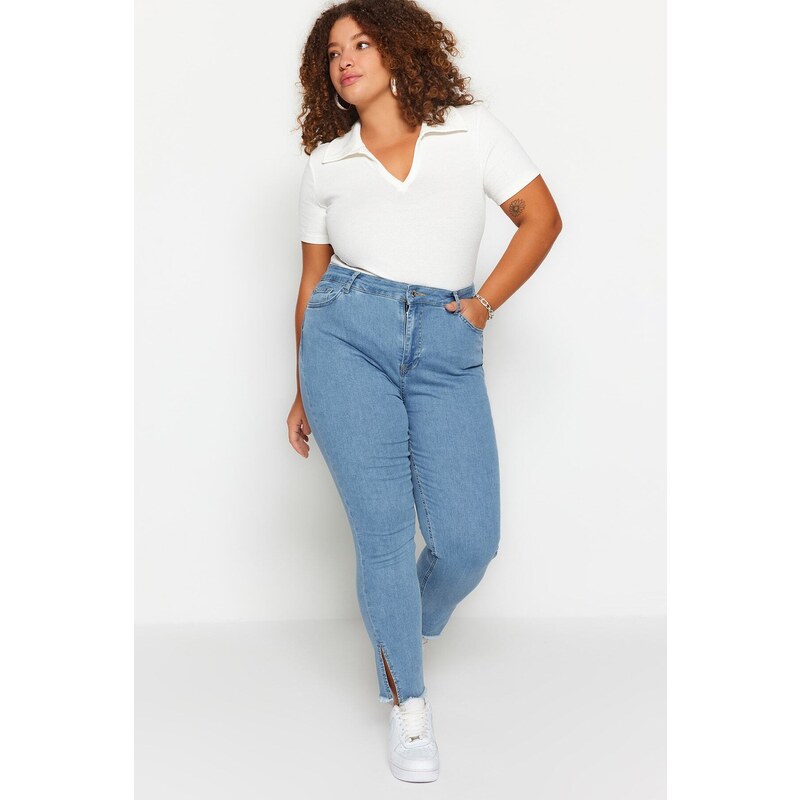 Trendyol Curve Blue flexibilní úzké džínové džíny s rozparkem a střapcem