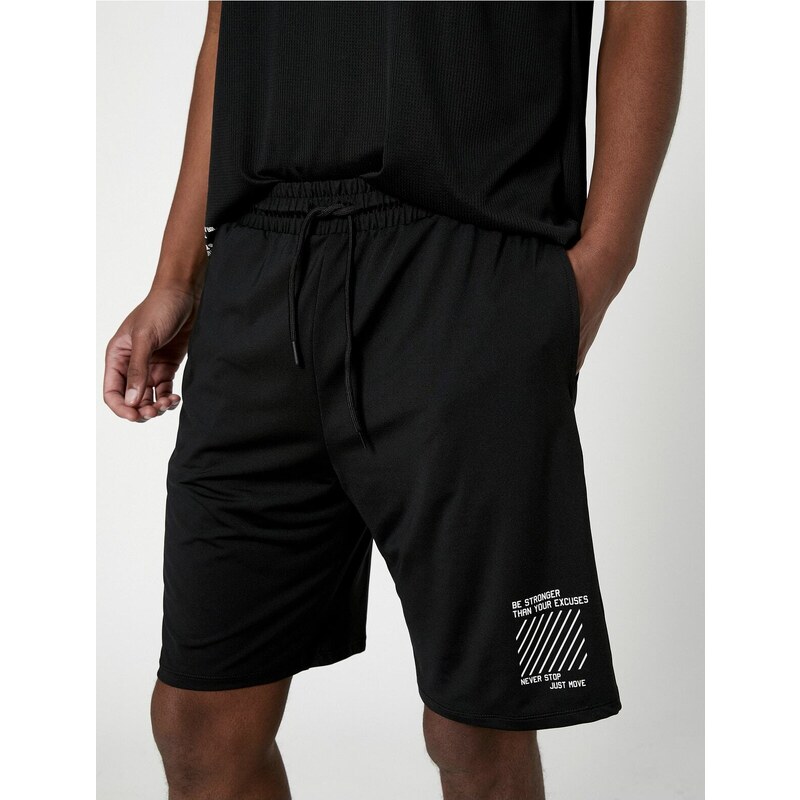 Koton Sports Shorts with Lace-Up Waist, Pocket with Slogan Print.