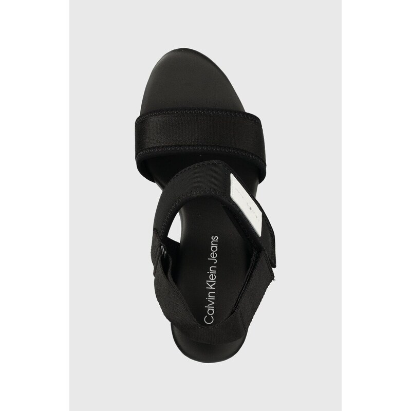 Sandály Calvin Klein Jeans WEDGE SANDAL BADGE dámské, černá barva, na klínku, YW0YW01028