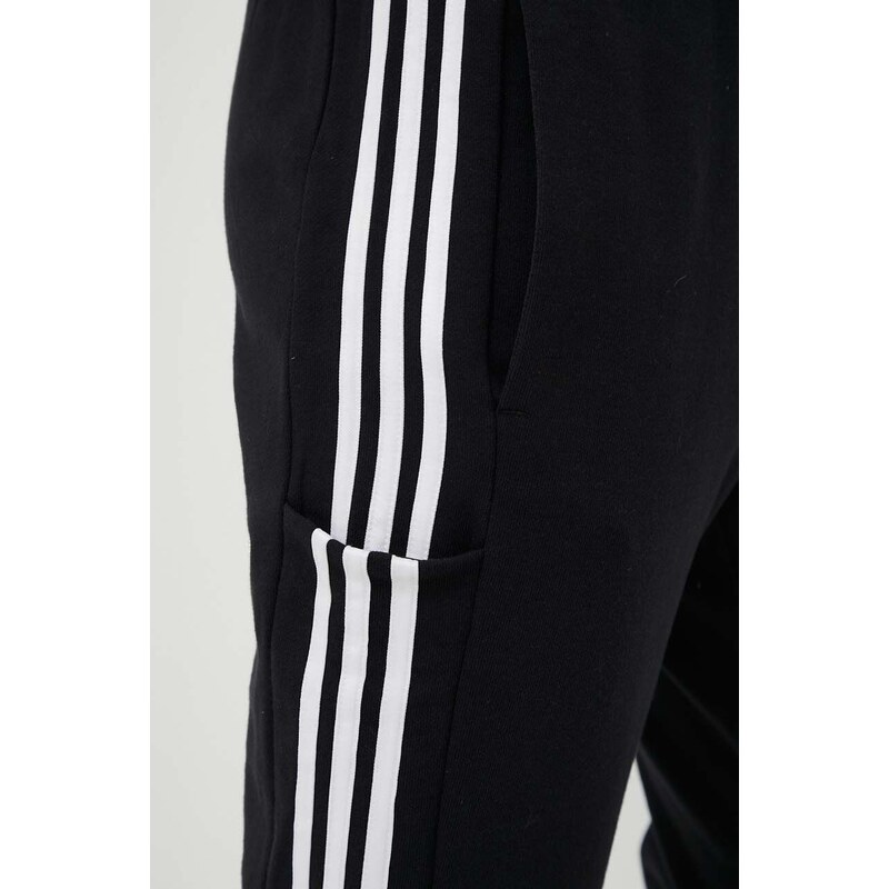 Bavlněné tepláky adidas černá barva, s aplikací, IC0050