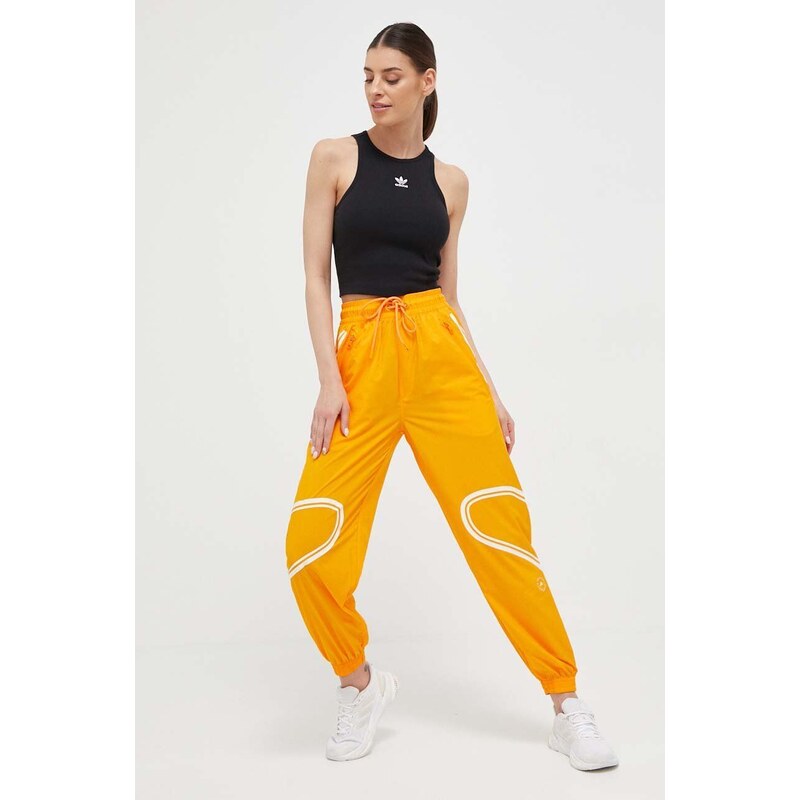 Tréninkové kalhoty adidas by Stella McCartney TruePace oranžová barva, s potiskem