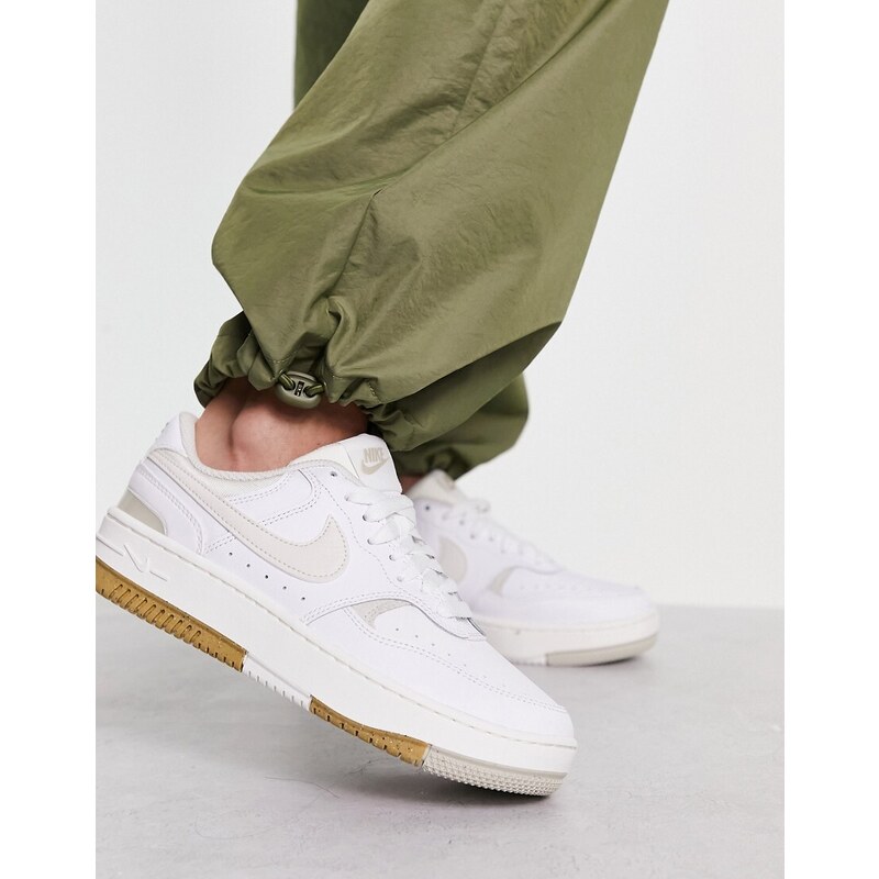 Nike Gamma Force trainers in white and light bone