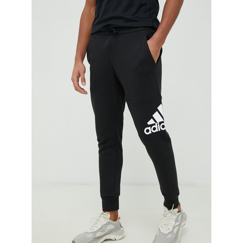 Bavlněné tepláky adidas černá barva, s potiskem, HA4342