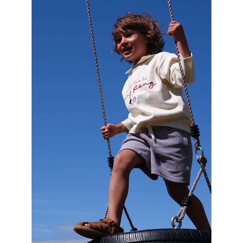 Dětská bavlněná košile s dlouhým rukávem Konges Sløjd béžová barva, s aplikací