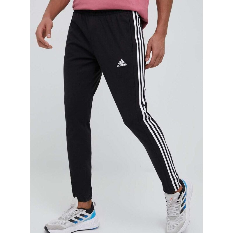 Tréninkové kalhoty adidas Essentials černá barva, s aplikací, IC0044