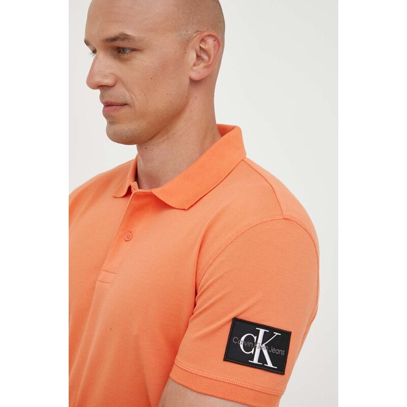 Bavlněné polo tričko Calvin Klein Jeans oranžová barva