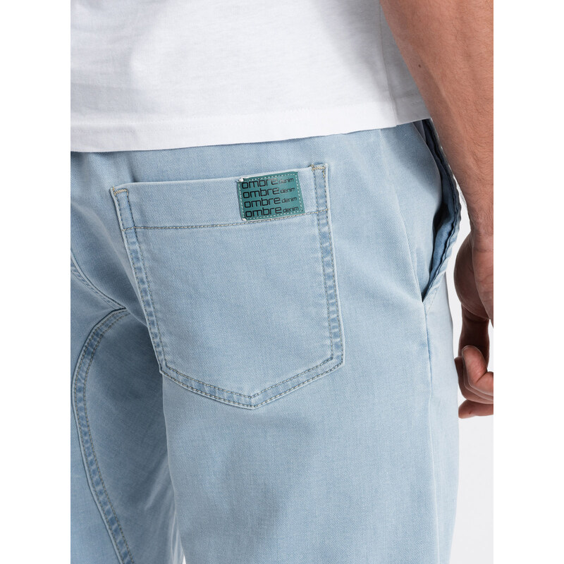 Ombre Spodnie męskie JOGGERY z kieszenią cargo - jasnoniebieskie