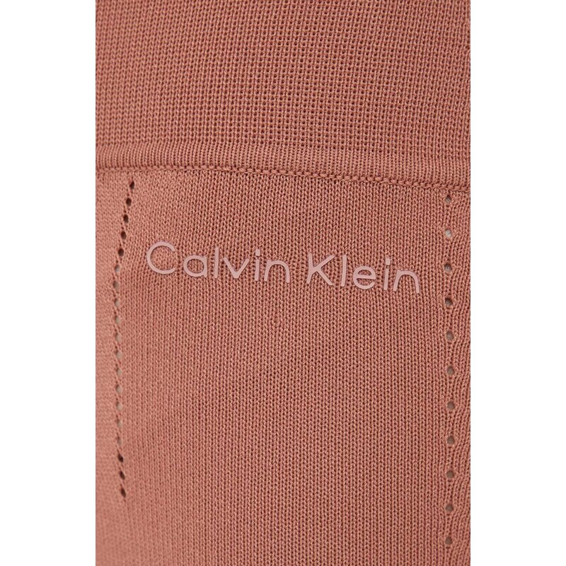 Legíny Calvin Klein dámské, oranžová barva, hladké