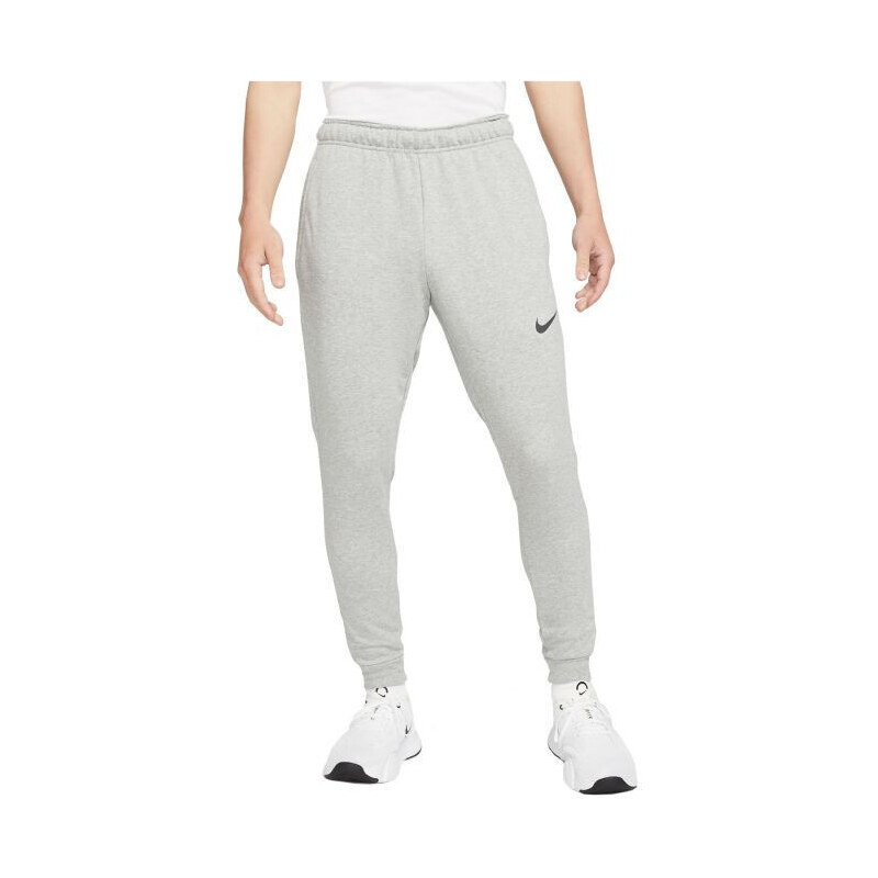 Pánské tréninkové kalhoty Dri-Fit Trapered M CZ6379-063 šedé -