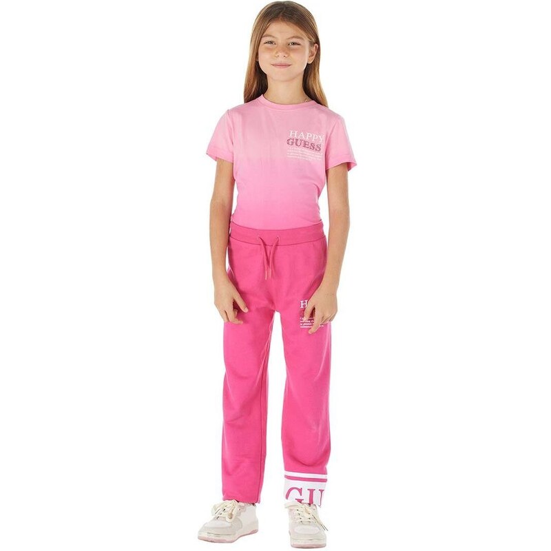 Dětské bavlněné tepláky Guess růžová barva, s potiskem