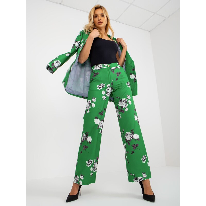 Fashionhunters Zelené široké látkové kalhoty s květinami z obleku
