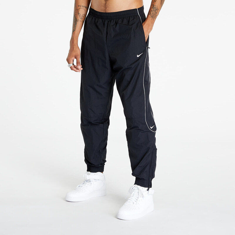 Pánské šusťákové kalhoty Nike Solo Swoosh Men's Track Pant Black/ White