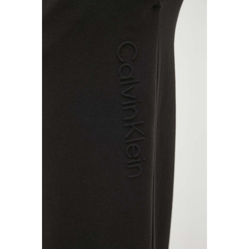 Tepláky Calvin Klein černá barva, s aplikací