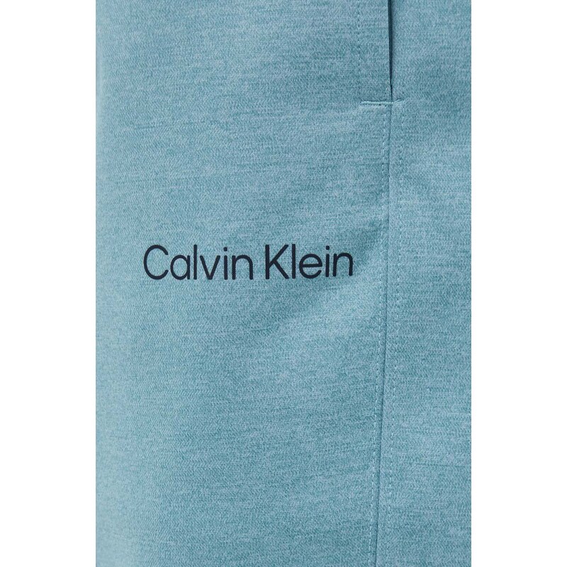 Tréninkové kalhoty Calvin Klein Performance zelená barva, melanžové
