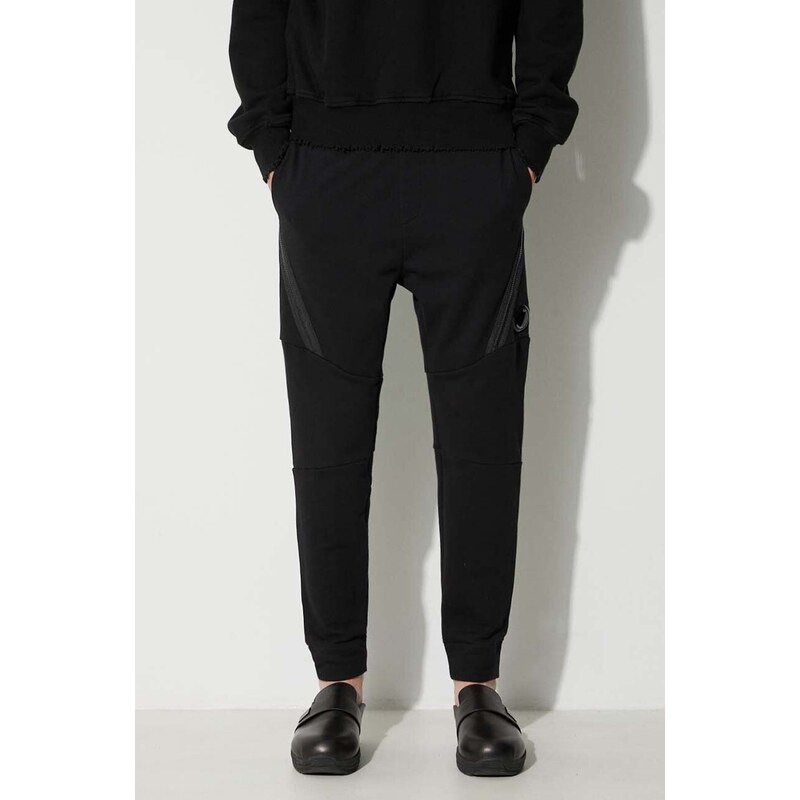 Bavlněné tepláky C.P. Company DIAGONAL RAISED FLEECE ZIPPED TRACK PANTS černá barva, 15CMSP084A005086W