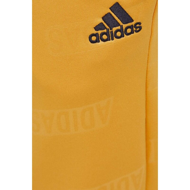 Tepláky adidas žlutá barva, vzorované