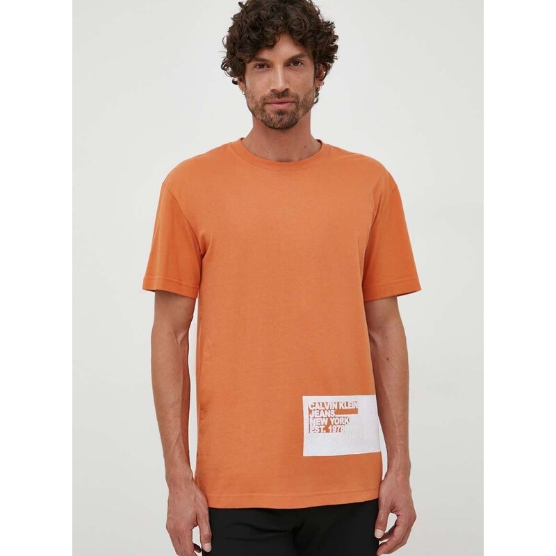 Bavlněné tričko Calvin Klein Jeans oranžová barva, s potiskem