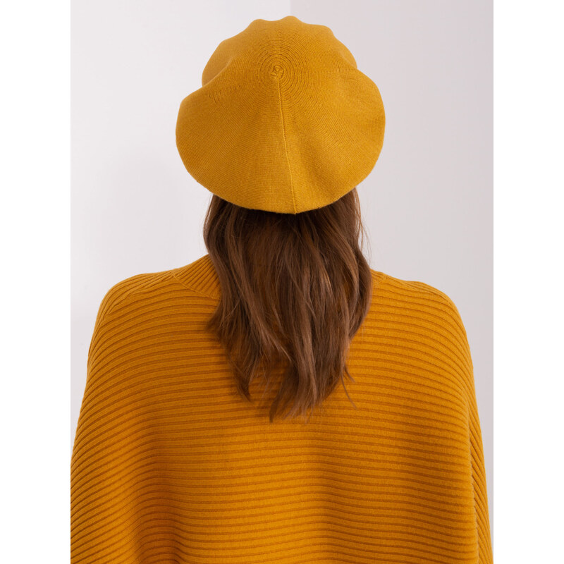 Fashionhunters Hořčičný dámský baret s aplikacemi
