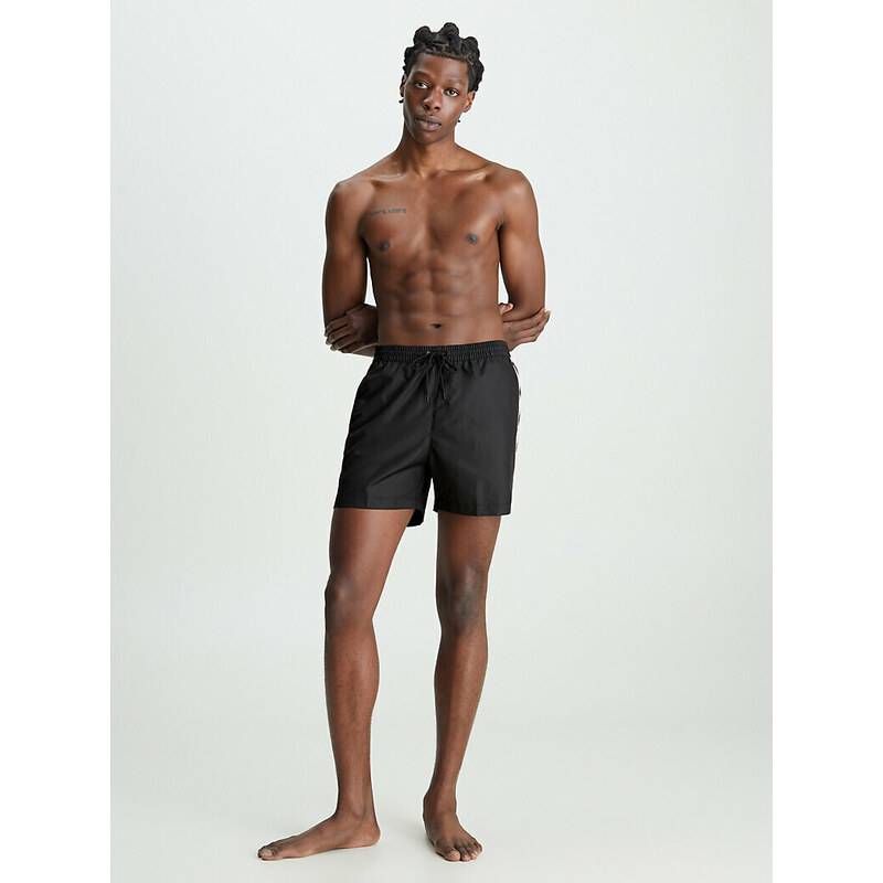 Pánské plavky Medium Drawstring Swim Shorts Logo Tape KM0KM00741BEH černá - Calvin Klein