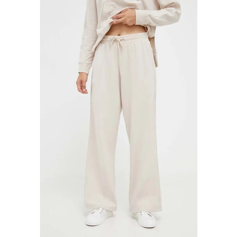 Dámské kalhoty UW0UW04771 ABH sv. béžové - Tommy Hilfiger