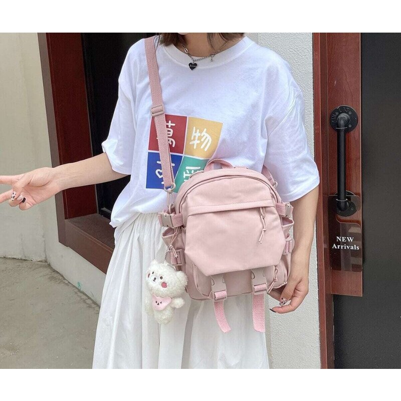 Malý dětský růžový batoh s klíčenkou