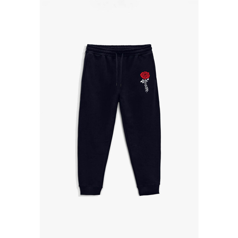 Tepláky Jogger , Barva Modrá, s Potiskem Hustle Rose