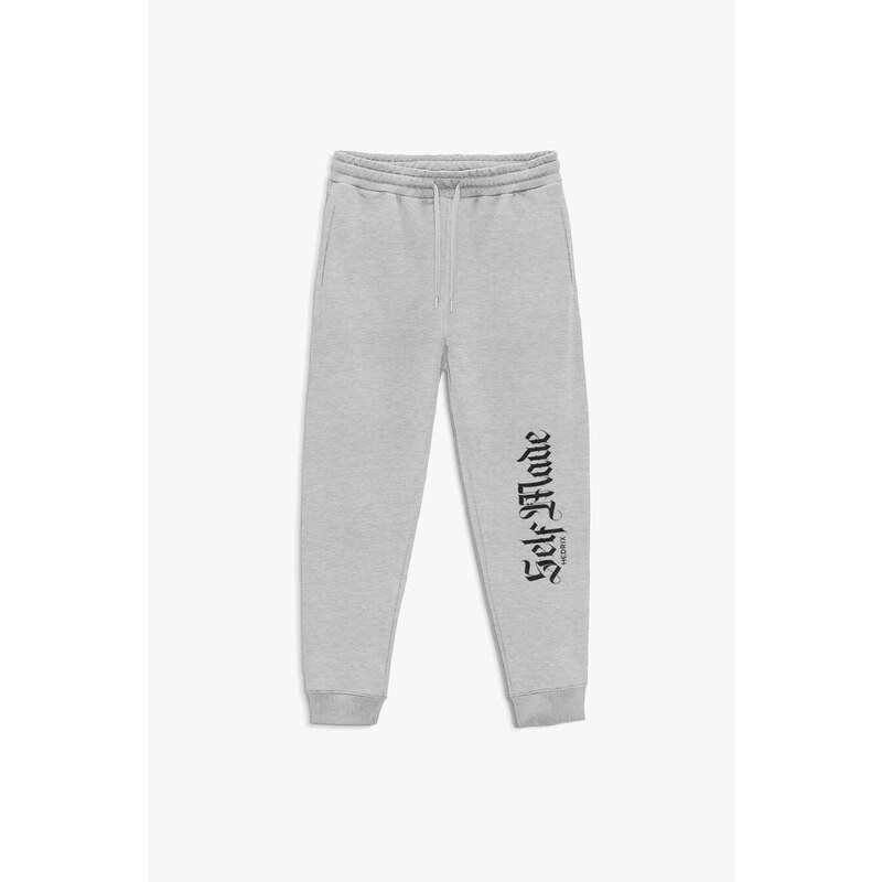 Tepláky Jogger , Barva Šedá, s Potiskem Self Made Man