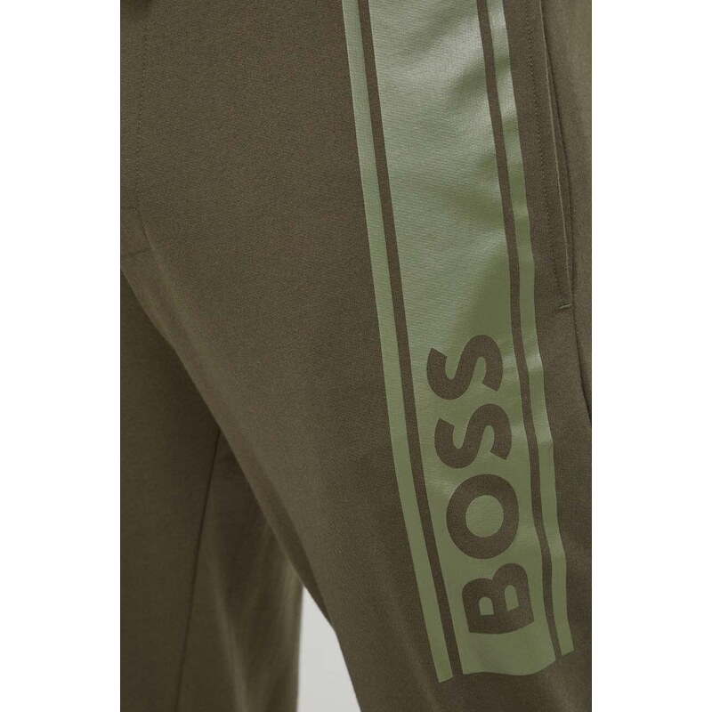 Bavlněné kalhoty BOSS zelená barva, s potiskem
