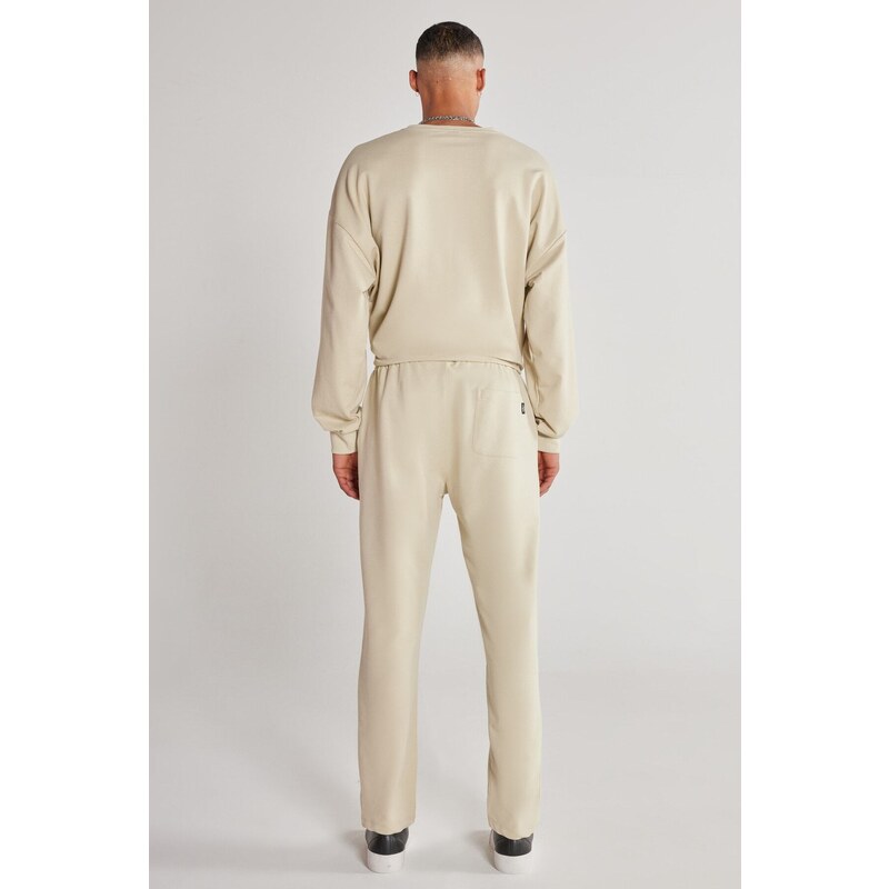 AC&Co / Altınyıldız Classics Unisex Beige Standard Fit Normal Cut, Flexible Cotton Sweatpants with Pockets.