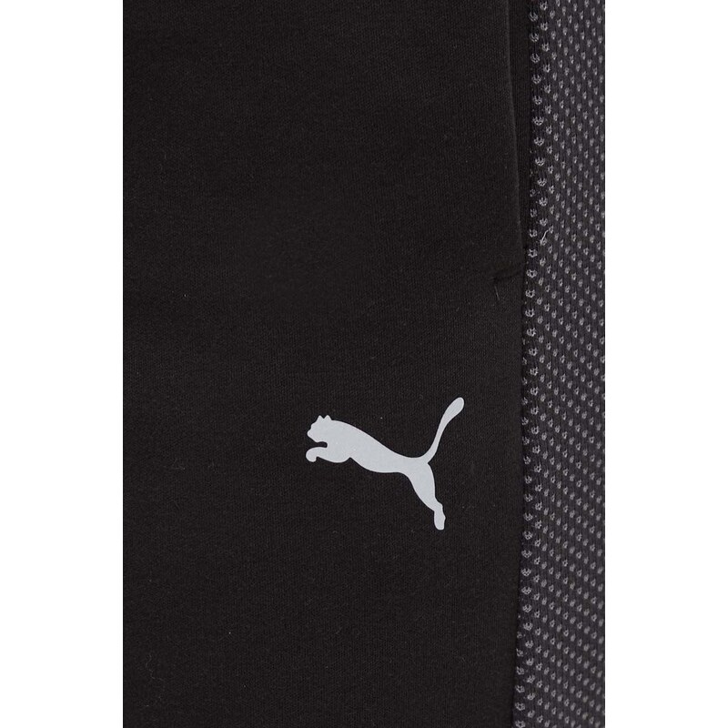 Tréninkové kalhoty Puma Evostripe černá barva, hladké
