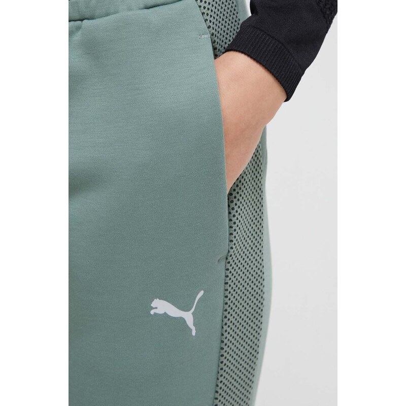 Tréninkové kalhoty Puma Evostripe zelená barva, hladké
