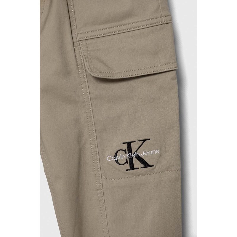 Dětské kalhoty Calvin Klein Jeans hnědá barva, hladké