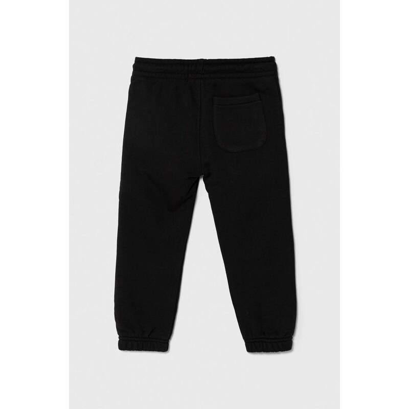 Dětské tepláky Calvin Klein Jeans černá barva, s potiskem