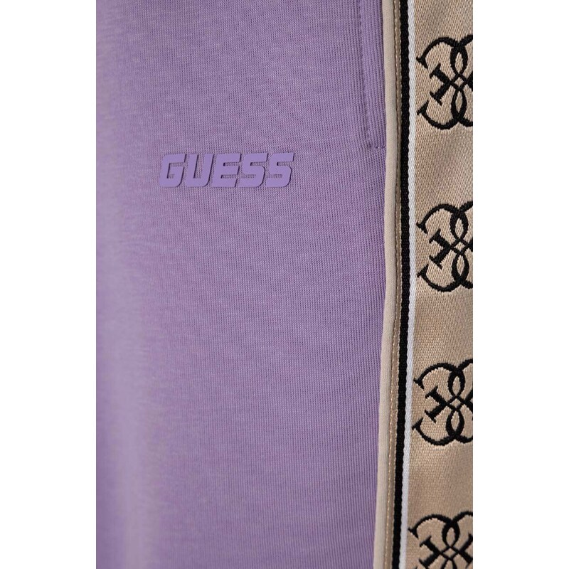Dětské tepláky Guess fialová barva, s aplikací
