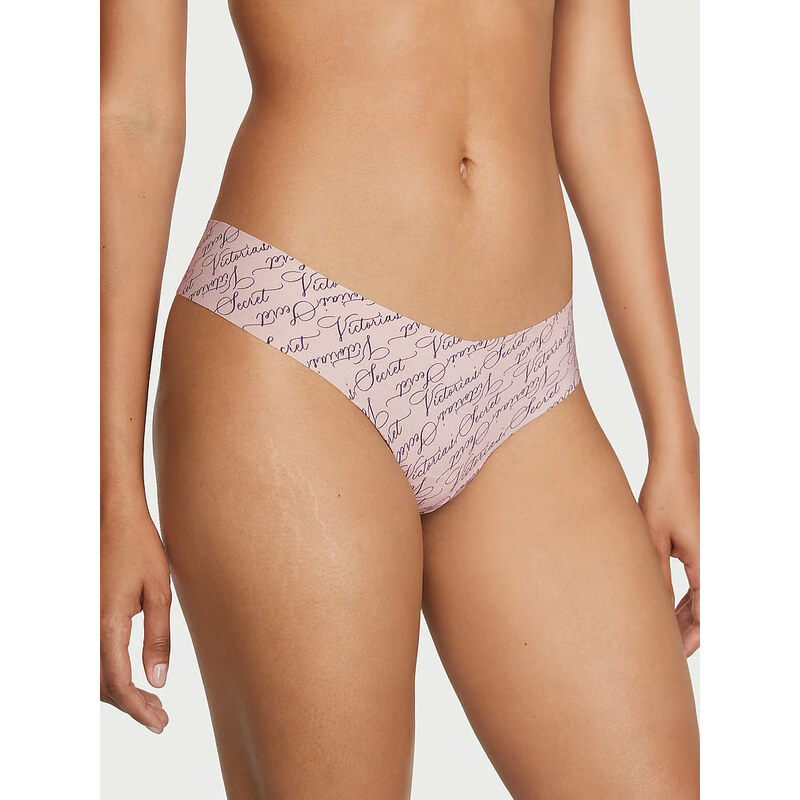 SEXY ILLUSIONS BY VICTORIA'S SECRET Bezešvé kalhotky tanga No Show Thong Light Pink