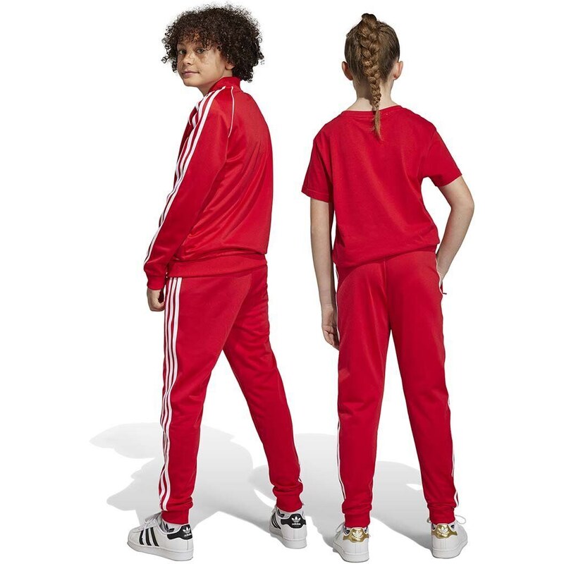Dětské tepláky adidas Originals červená barva, vzorované