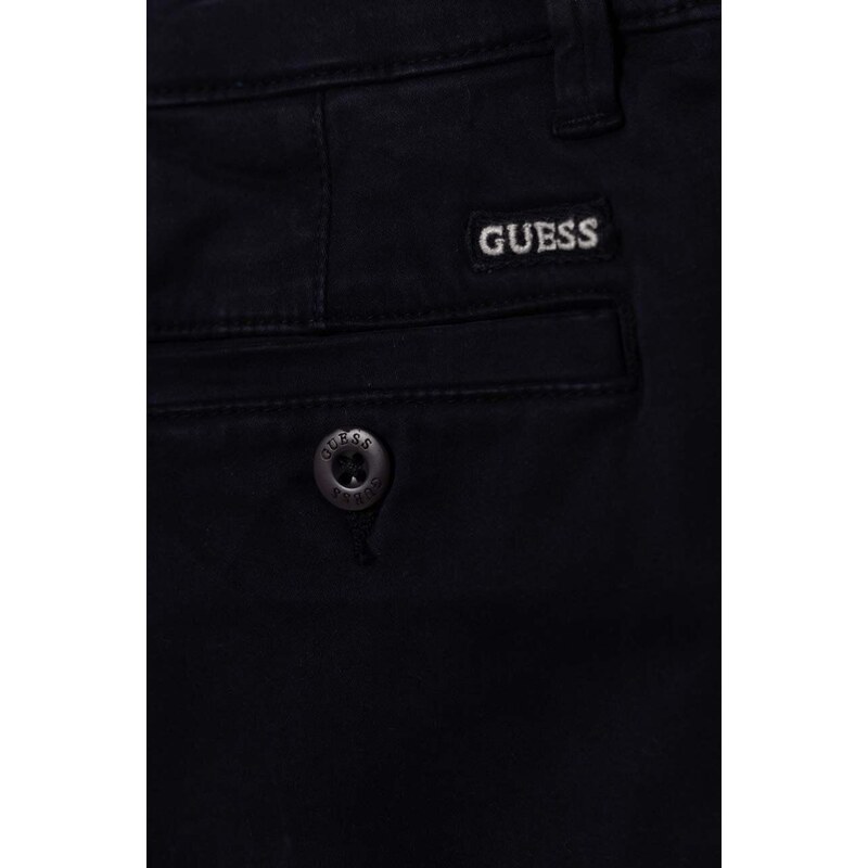 Dětské kalhoty Guess tmavomodrá barva, hladké