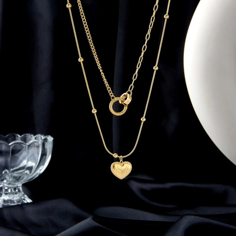 Camerazar Dvojitý náhrdelník z chirurgické oceli 316L s pozlaceným srdcem, délka 45+5 cm a 33+5 cm, antialergický