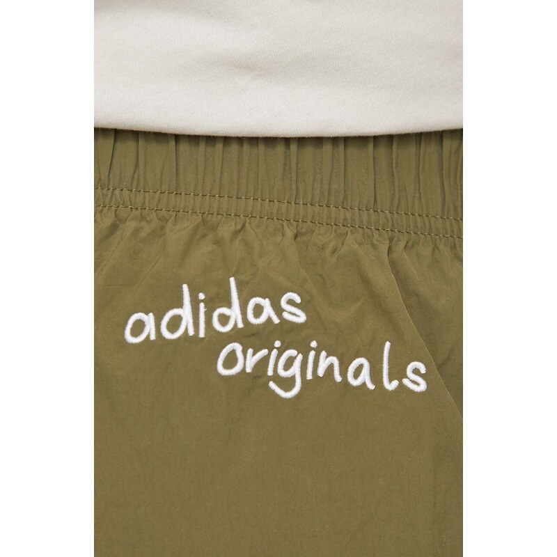 Tepláky adidas Originals zelená barva, hladké, IS0201