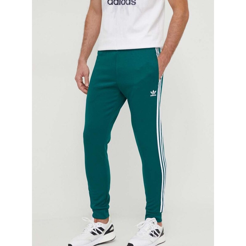 Tepláky adidas Originals zelená barva, s aplikací, IR9886