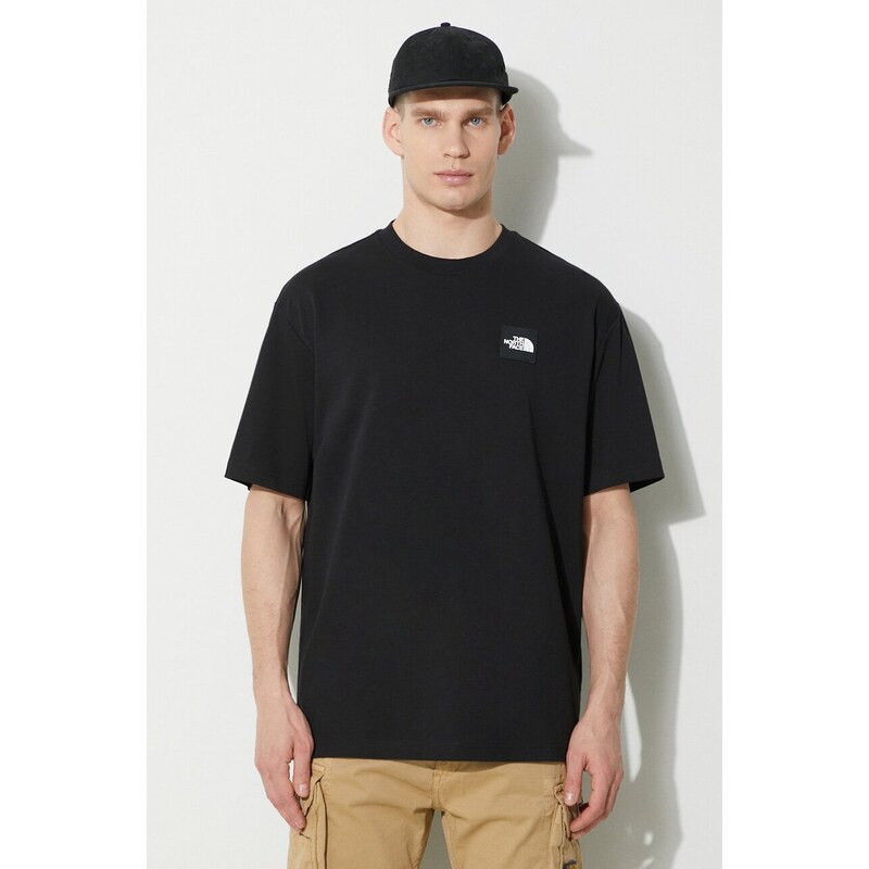 Bavlněné tričko The North Face M Nse Patch S/S Tee černá barva, s aplikací, NF0A87DAJK31