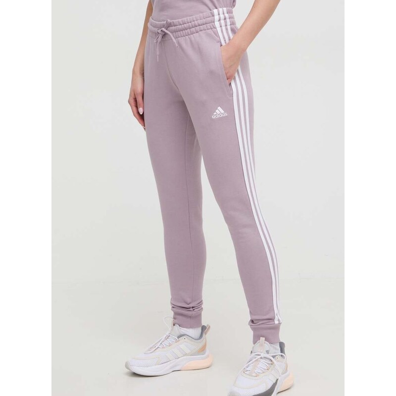 Bavlněné tepláky adidas fialová barva, IR5379