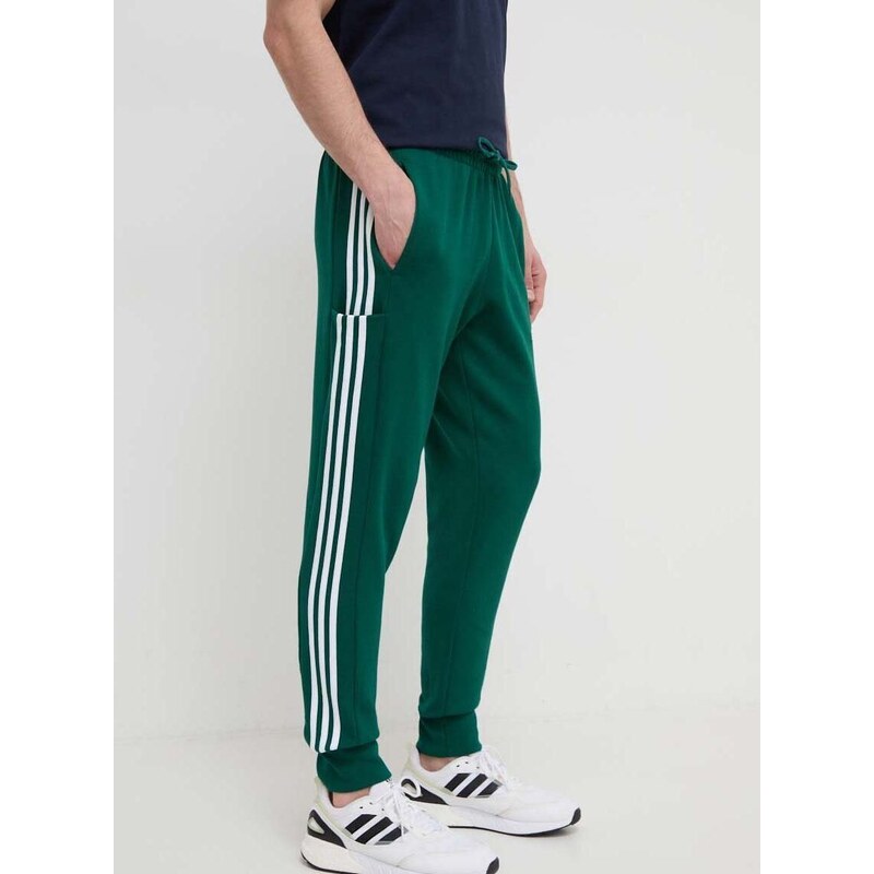 Bavlněné tepláky adidas zelená barva, s aplikací, IS1392