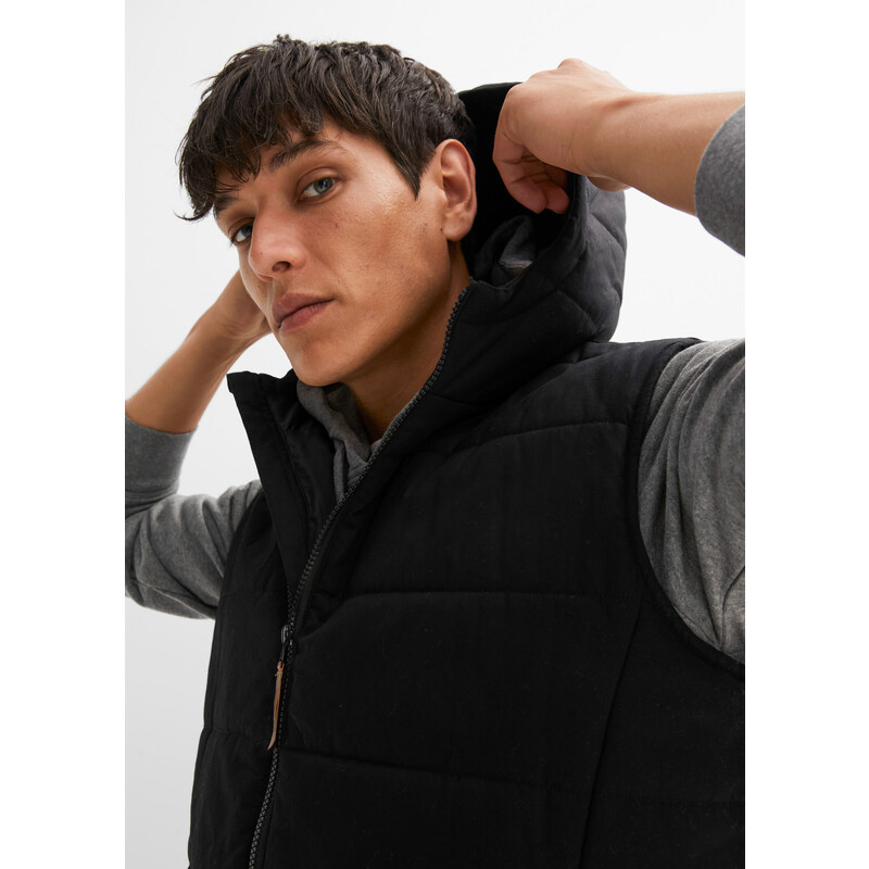 bonprix Prošívaná vesta s kapucí Černá
