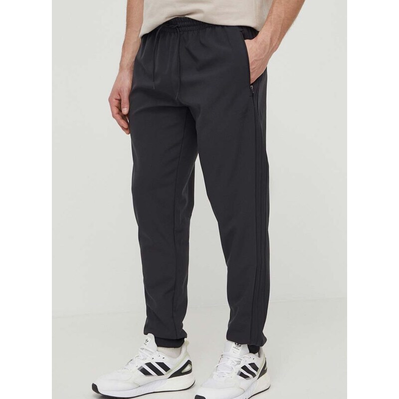 Tepláky adidas Originals černá barva, s aplikací, IM9880