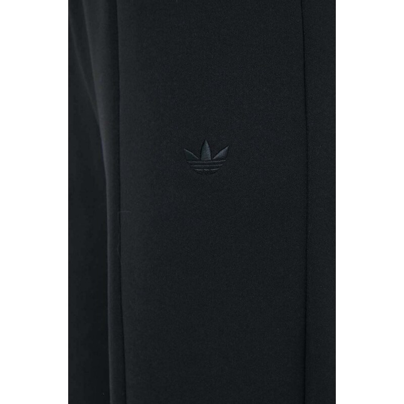 Tepláky adidas Originals Flared černá barva, hladké, IT9240