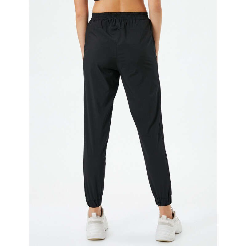 Koton Jogger Sweatpants with Elastic Waist and Legs, Zippered with Pocket.